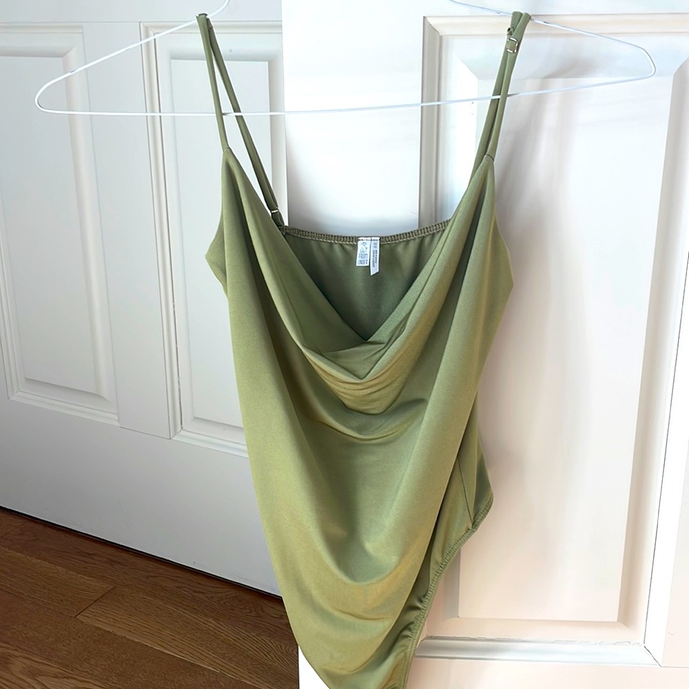 Green “out from under” bodysuit size xs